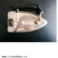 Маленький дорожный утюг