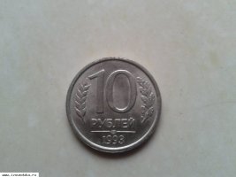монета